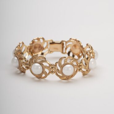 Bracciale artigianale a maglie in lega demirouge, finitura oro 14 KT.