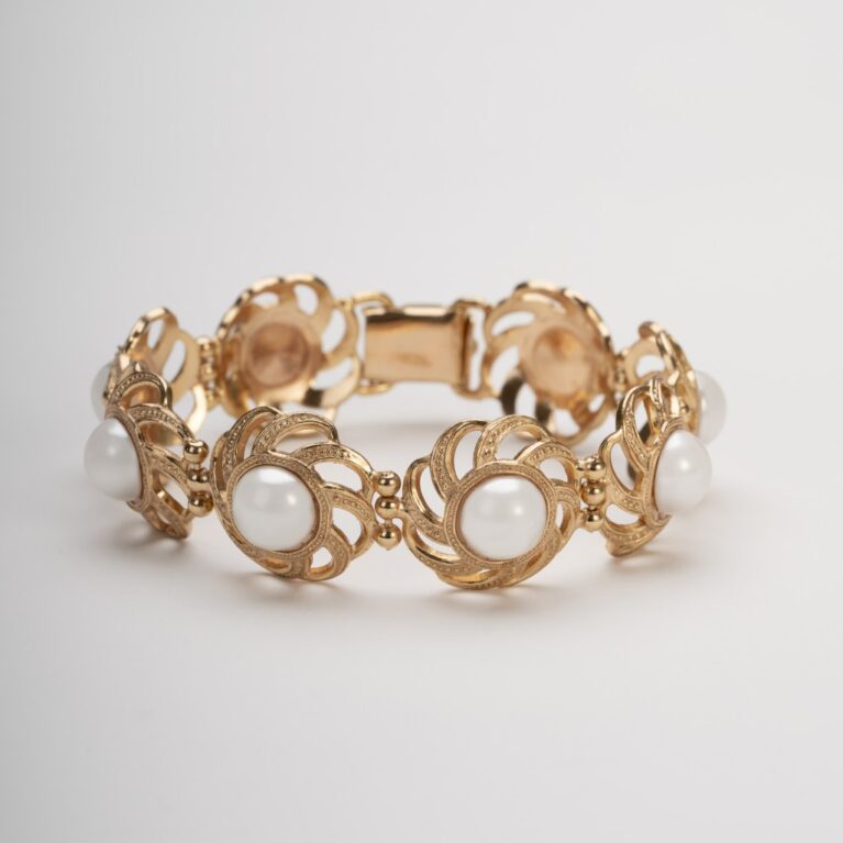 Bracciale margherite con perle d'imitazione.