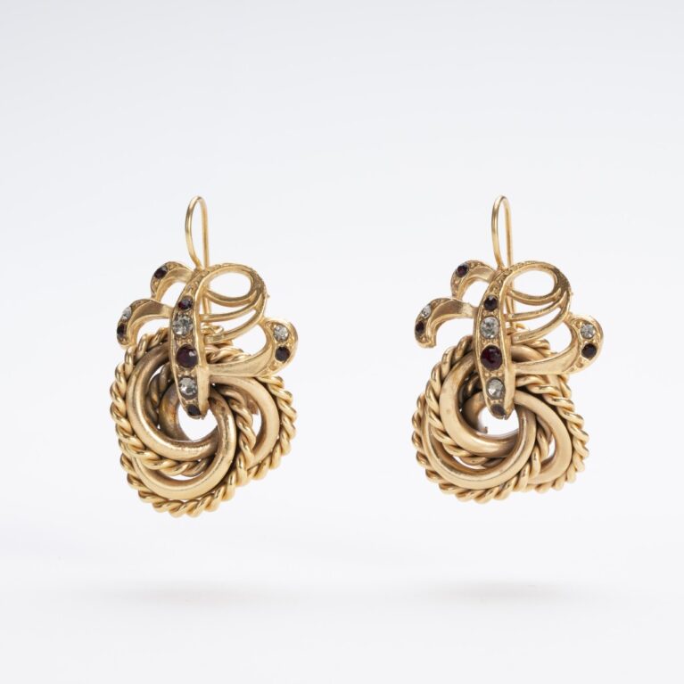 Orecchini in lega francese doratura 14kt torchon riccioli cristalli.