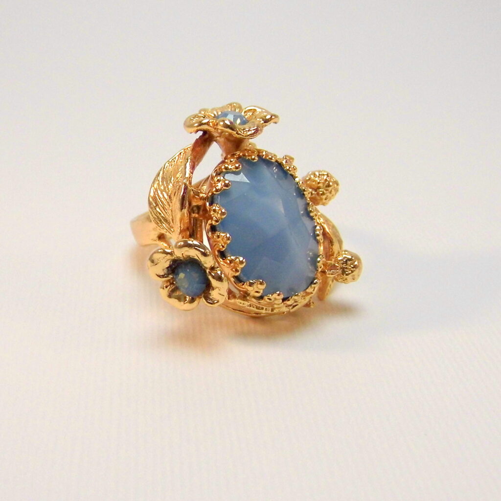 Art Nouveau style ring with flowers and leaves