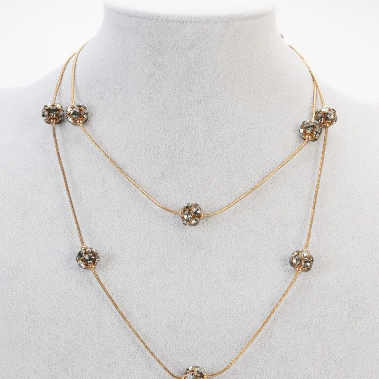 Collana lunga con sfere di cristalli fumè a doppio giro in metallo dorato – Pezzo Unico Atelier