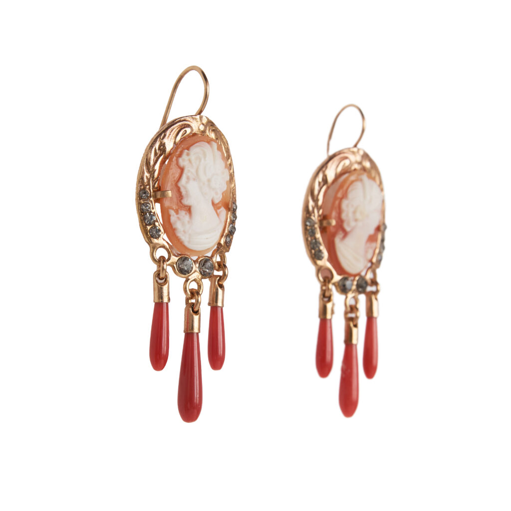 Dangling cameo earrings with red coral drops