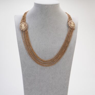 Elegant necklace with cameos and multi-strand chain