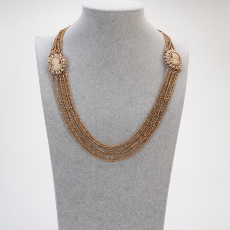 Elegant necklace with cameos and multi-strand chain
