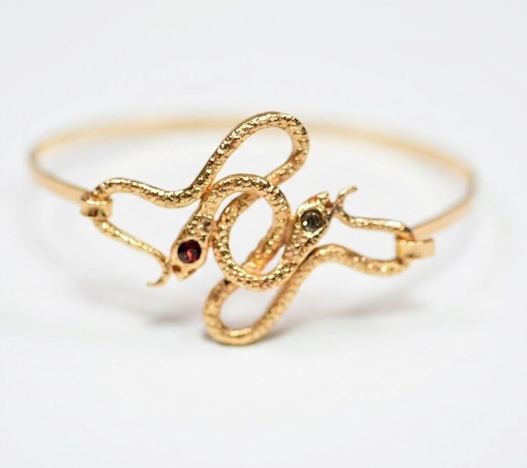 Bracciale rigido doppio serpente collezione antica eleganza.