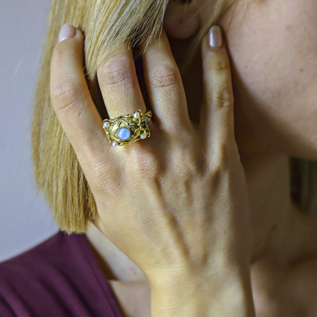 Cerulean Crystal and Pearl Ring: Geometry and Romance from Ancient Charm