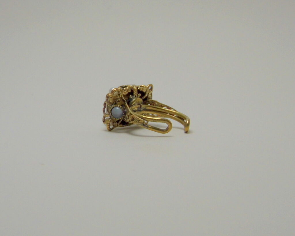 Cerulean Crystal and Pearl Ring: Geometry and Romance from Ancient Charm