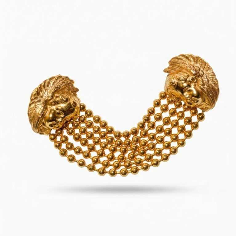 Spilla con due teste d'angelo alato e catenelle dorate oro 14 KT.