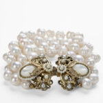 Bracciale Borbonico Multifilo con Perle di Fiume Perle Scaramazze e Chiusura Scultorea in Madreperla e Filigrana